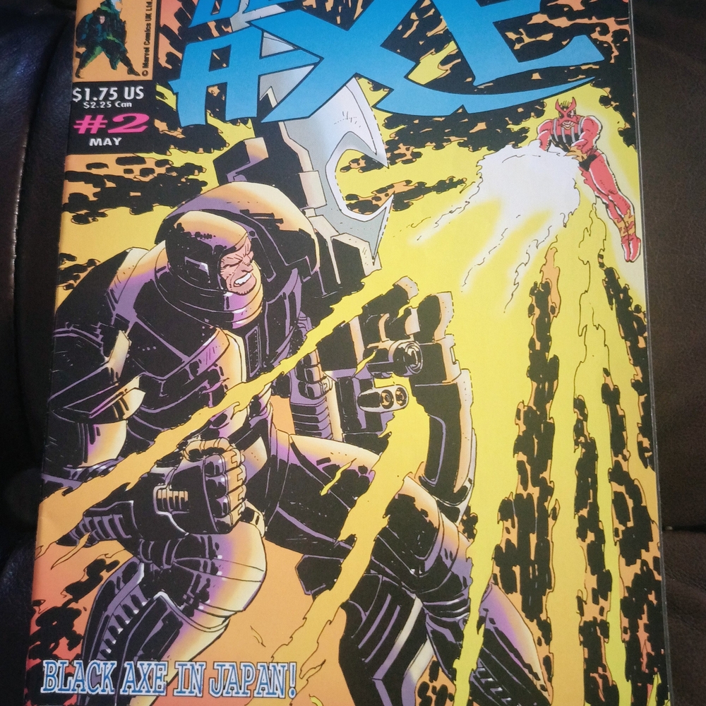 Marvel Comic with Black, Yellow, and Red Cover